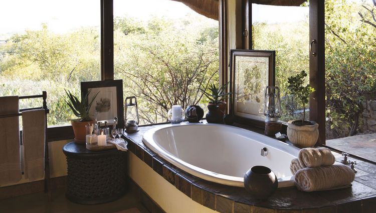 Tuningi Safari Lodge - Bad einer Suite